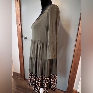 Army green and leopard print.  Boutique brand Size MED